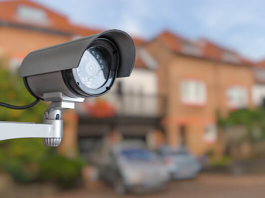 Hero image showcasing IUFUTURE's smart security products, including surveillance cameras, smart doorbells, and access control systems for businesses and homes.